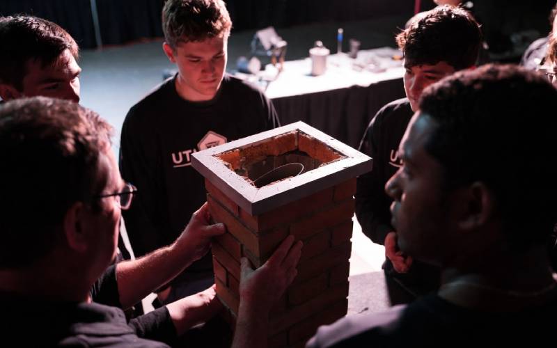 Hands-on chimney training class with instructor and students